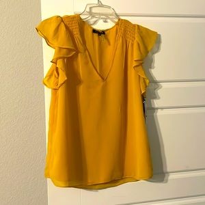 1. State new with tags mustard color top